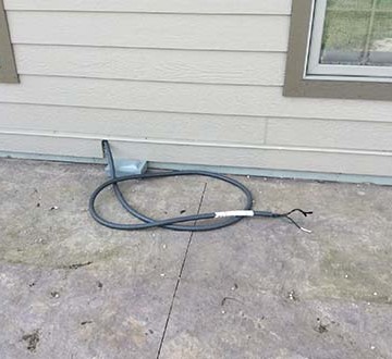 Sheboygan and Manitowoc WI Residential Home Inspection - Old hot tub wire left after tub was sold